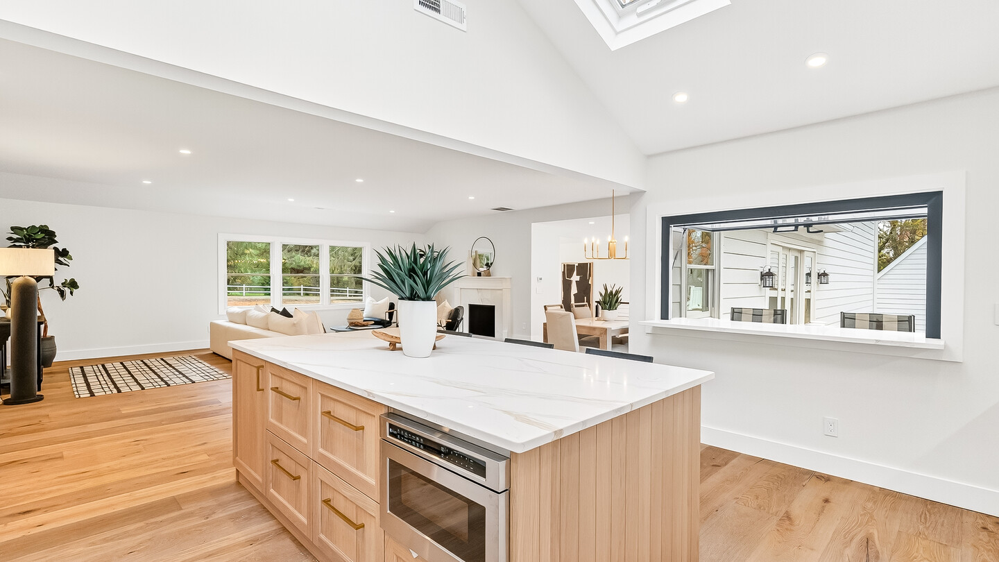 The White — white oak island open to the great room